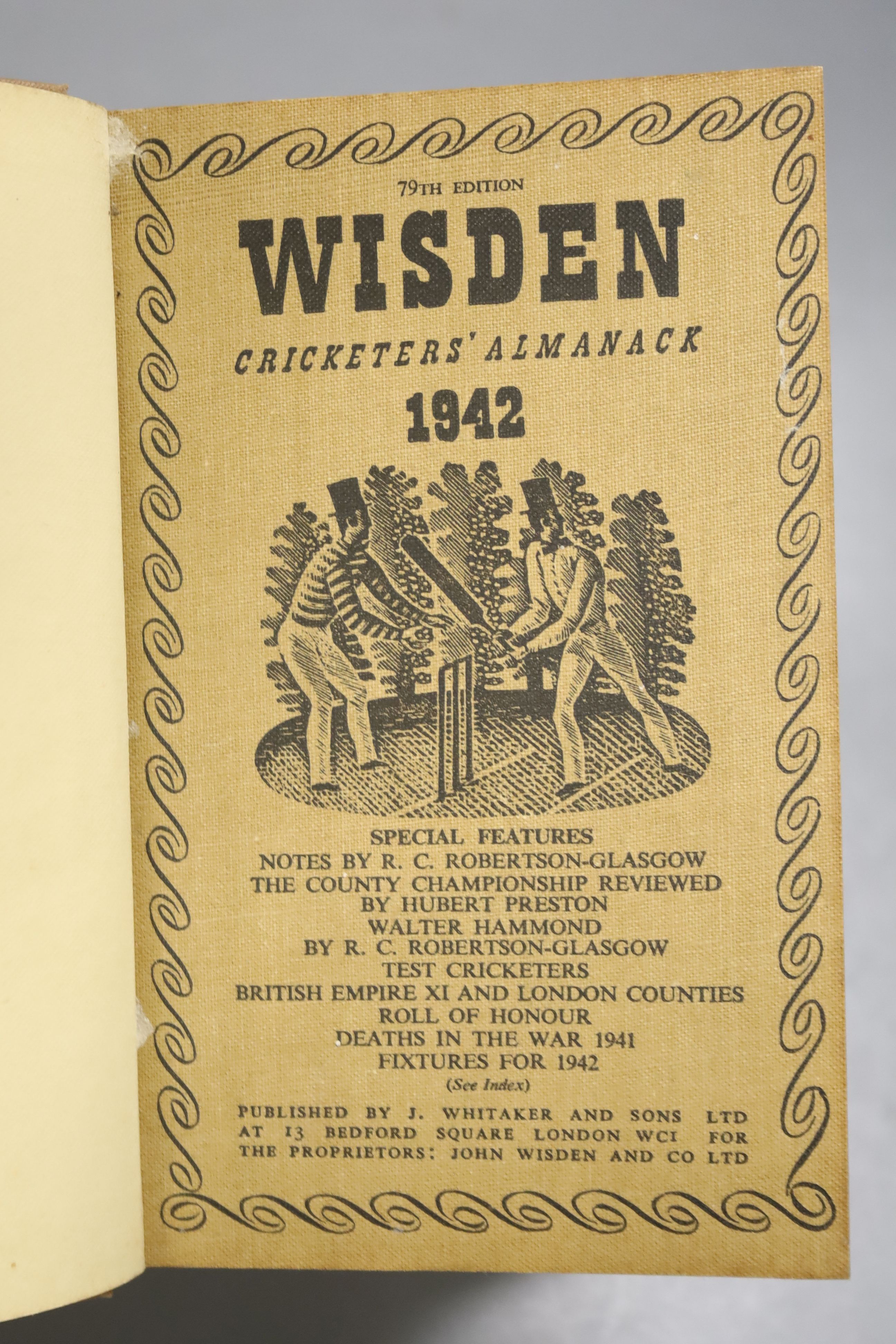 Wisden Cricketers' Almanack, 1942 - pictorial title vignette, photo plates, gilt lettered brown cloth preserving the original pictorial